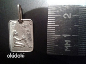 Veevalaja ja vähi märgi hõbedased ripatsid (1 foto / 2)