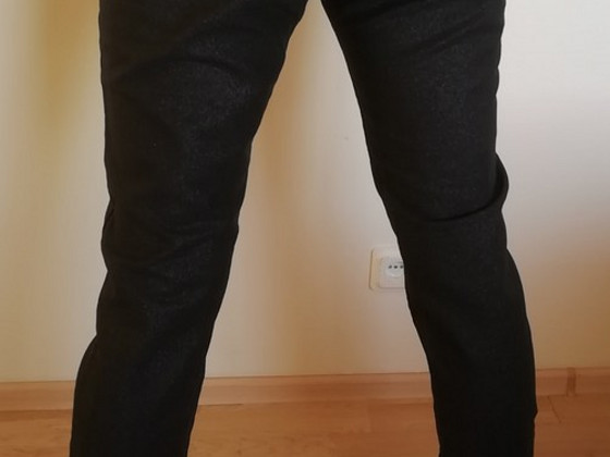 Uued Sädelevad mustad püksid 40-42