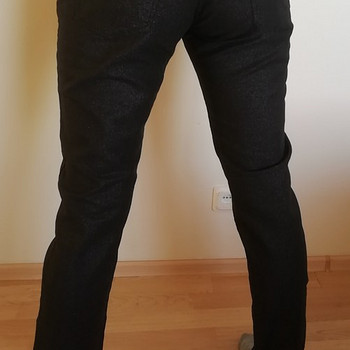 Uued Sädelevad mustad püksid 40-42