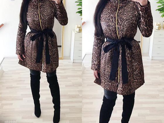 Куртка с рисунком животных.