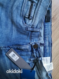 UUED Originaal CALVIN KLEIN TEKSAD W26L32 (1 foto / 3)