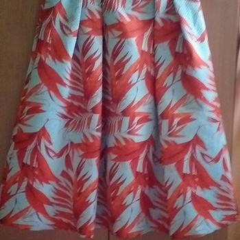Платья