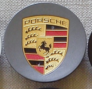 Знаки, колпачки заглушки Porsche (1 фото из 2)