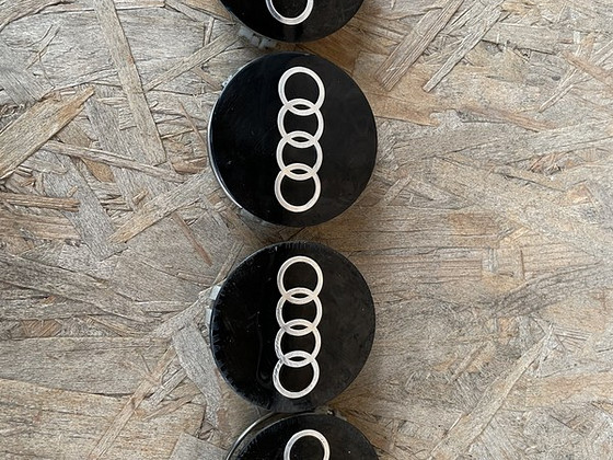 Капсюли литых дисков audi 75 мм