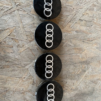 Капсюли литых дисков audi 75 мм