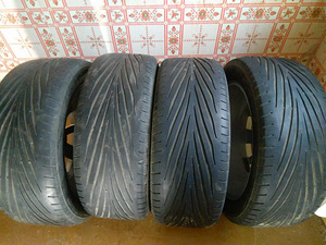 Фольксваген тигуан оригинальные диски и шины (2 фото из 8)