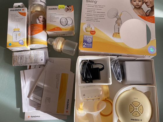 Medela электрический молокотсос, новые бутылочки и накладки