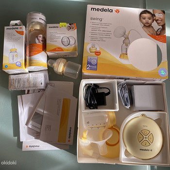 Medela электрический молокотсос, новые бутылочки и накладки