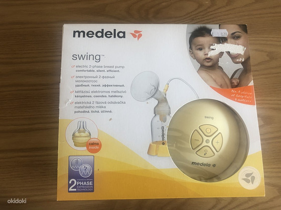 Электрический молокоотсос medela