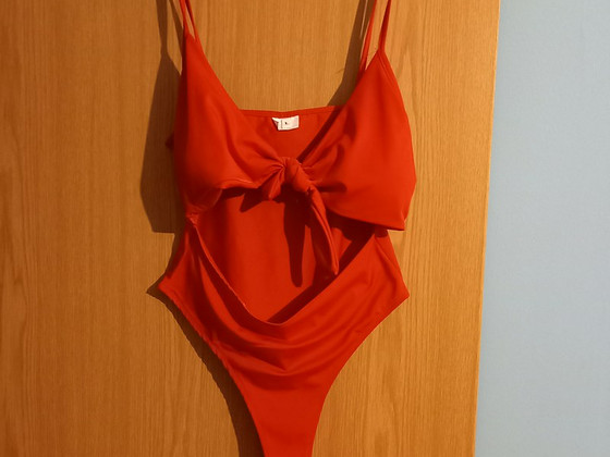Продам новый купальник L