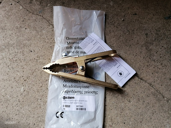 Продам новый зажим масса