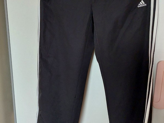 Uued Adidas Õhukesed püksid 42-44