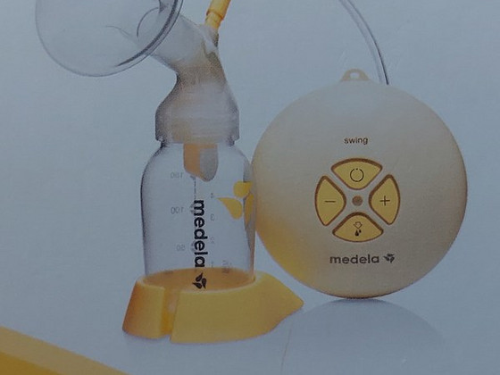 Молокоотсос medela, защитная насадка для сосков medela и сумки для хранения