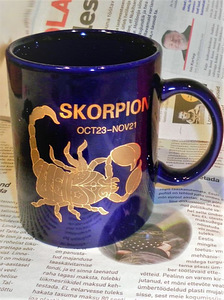Ilus erksinine-kuldne suur kruus Scorpio, uus (7 foto / 7)