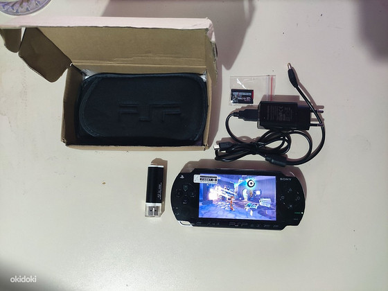PSP 1000 jailbroken + карта памяти 64 Гб + игры