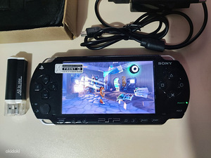 PSP 1000 jailbroken + 64GB memory card + games (1 foto / 3)