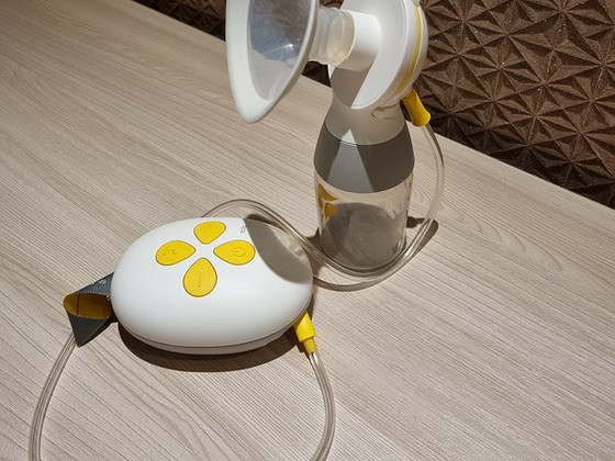 Молокоотсос MEDELA