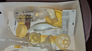 Молокоотсос Medela (2 фото из 2)