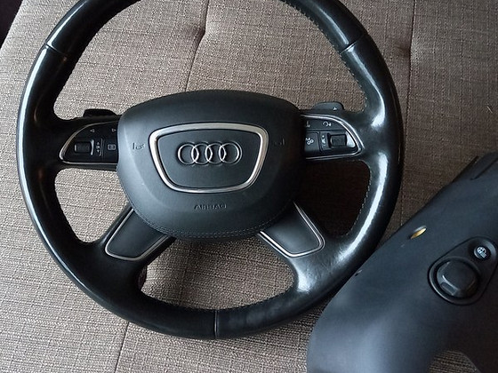 Продам руль AUDI A8 с подогревом и подрулевыми лепестками.
