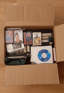 CD-plaadid filmide ja videokassettidega. (2 foto / 2)