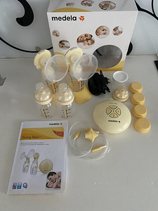 Молокоотсос Medela Swing Max (1 фото из 1)
