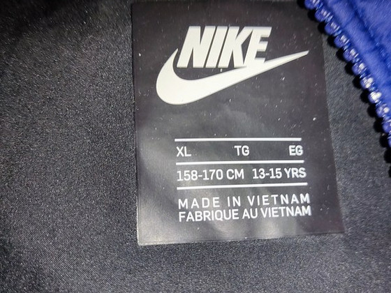 Пуховик Nike новый