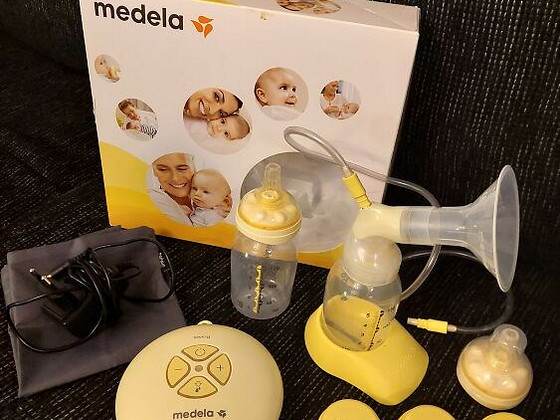 Молокоотсос Medela Swing