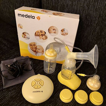Молокоотсос Medela Swing