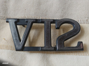 Jaguar V12 originaal embleem (1 foto / 2)