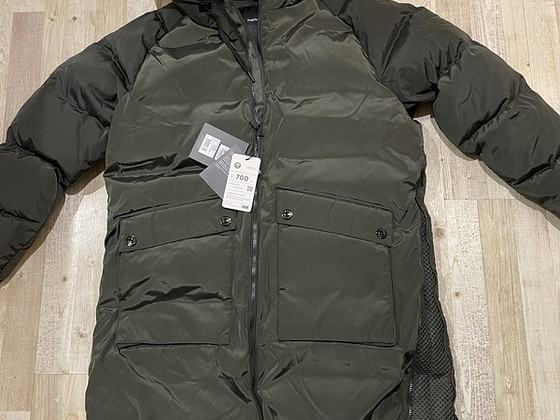 Новый женский пуховик Peak Performance Stella