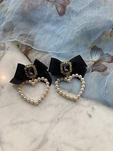 Серьги с бантом (3 фото из 3)