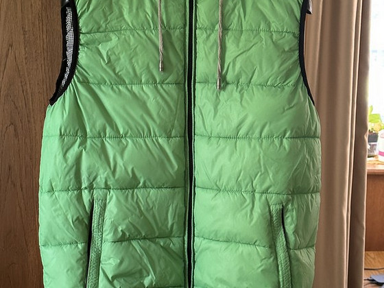 Müüa vähekasustatud soe vest,160-174 cm