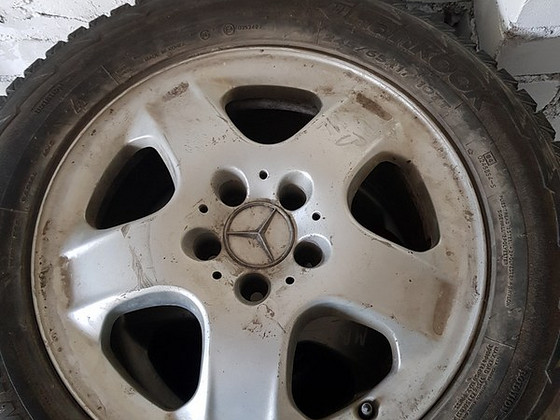 Продам шипованную резину Hankook на дисках ML