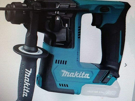 Аккумуляторная ударная дрель Makita SDS HR140 12 В