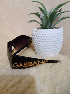 Оригинальные солнцезащитные очки Dolce Gabbana. (1 фото из 9)