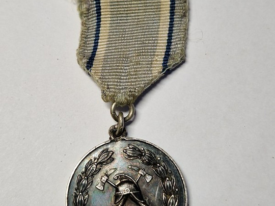EW aegne tuletõrje medal Teenete eest