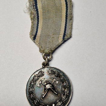 EW aegne tuletõrje medal Teenete eest