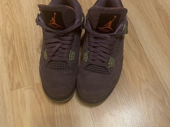 Jordan 4 purple
