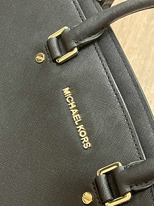 Michael Kors kott (5 foto / 5)