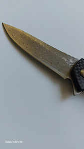 Damaskuse terasest taskunuga (2 foto / 4)
