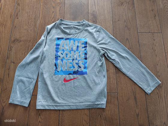 Спортивная футболка Nike приличного размера 116-122