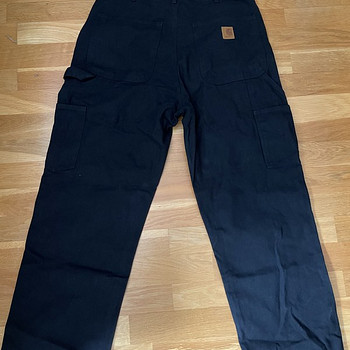 Carhartt mustad püksid