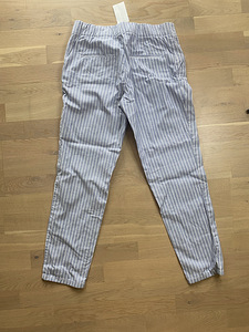 Новые брюки с бирками H&M, размер 40. (2 фото из 2)