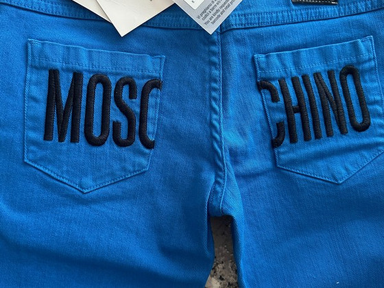 Джинсы Moschino для ребенка