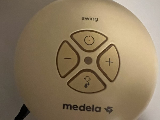 Молокоотсос Medela