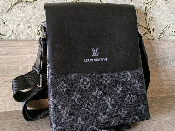 Кожаная сумка Louis Vuitton