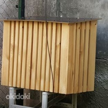 Деревянный защитный короб воздушного теплового насоса