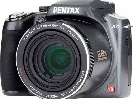 Цифровая фотокамера Pentax X90 SR + зарядное устройство