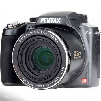 Цифровая фотокамера Pentax X90 SR + зарядное устройство