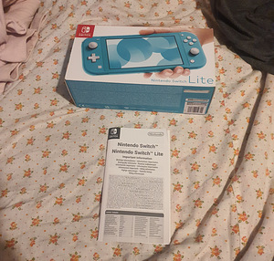 Nintendo Switch Lite + чехол (5 фото из 6)